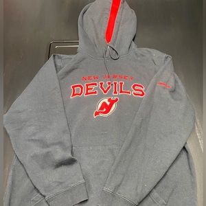 Medium Reebok NHL official Red Devils hoodie from 2010s